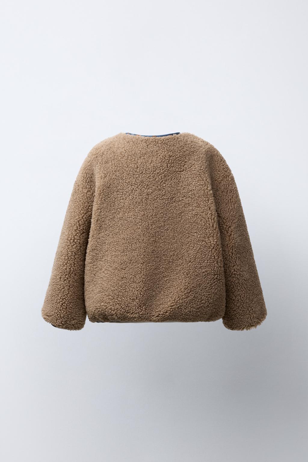 КУРТКА ИЗ ИСКУССТВЕННОЙ ОВЧИНЫ С ЦВЕТОЧНЫМ ПЭЧВОРКОМ