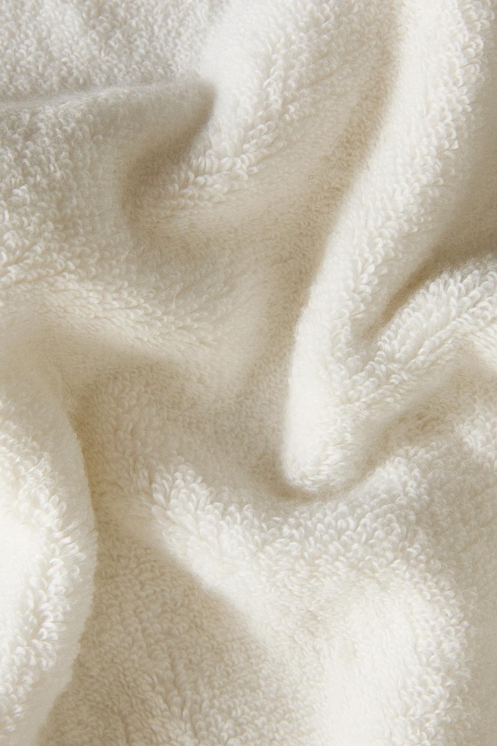 Полотенце для ванны с волнующим краем