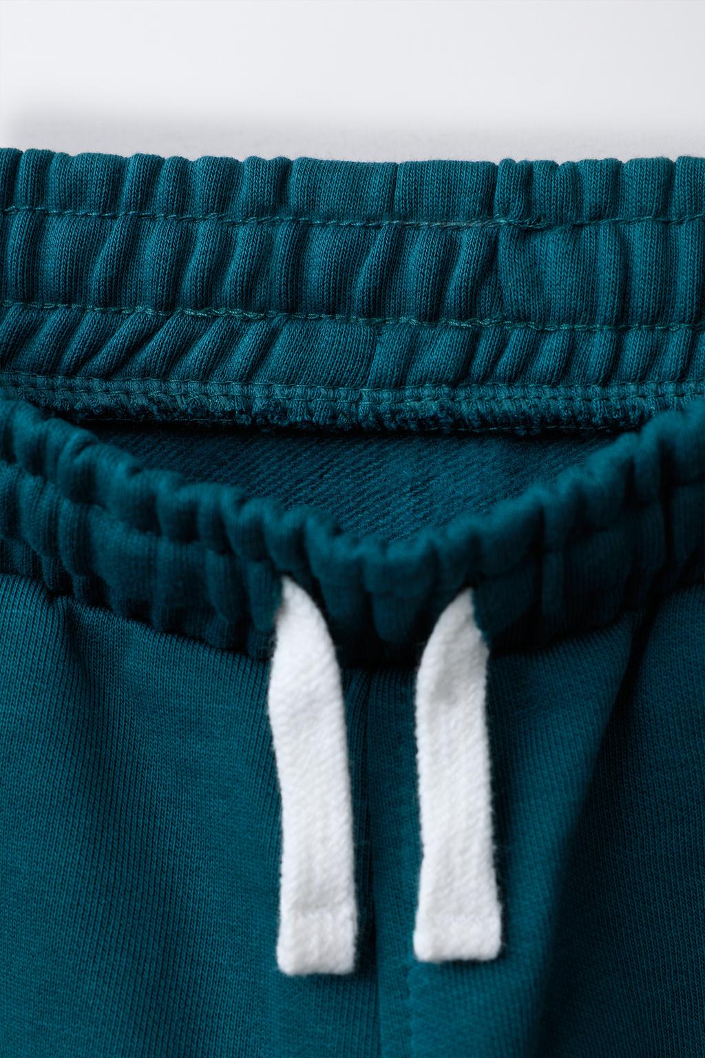 ДЖОГГЕРЫ ИЗ МЯГКОЙ ТКАНИ С НОМЕРОМ