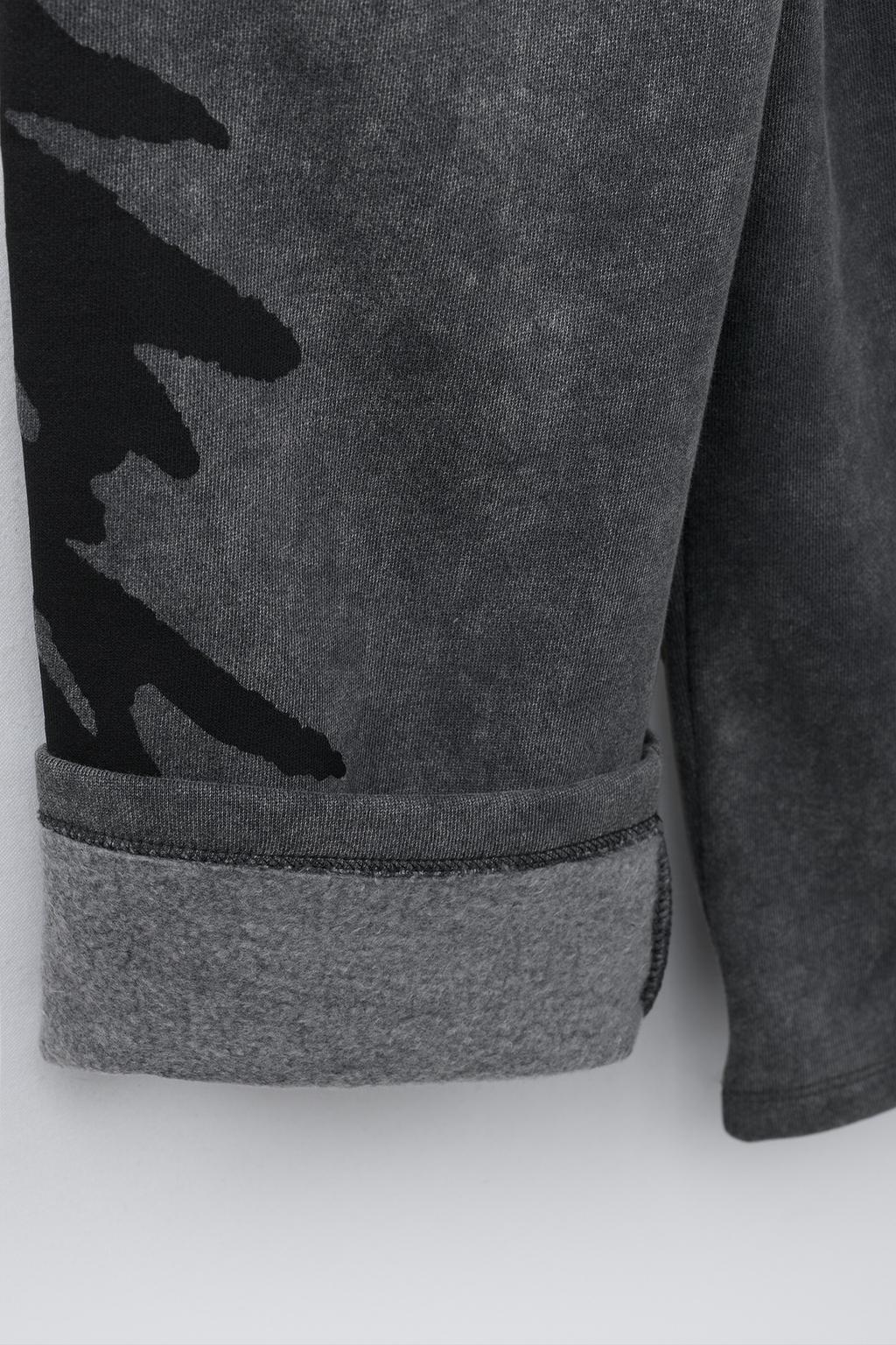 БРЮКИ WIDE LEG ИЗ МЯГКОЙ ТКАНИ С ЭФФЕКТОМ ПОТЕРТОСТИ И ГРАФФИТИ