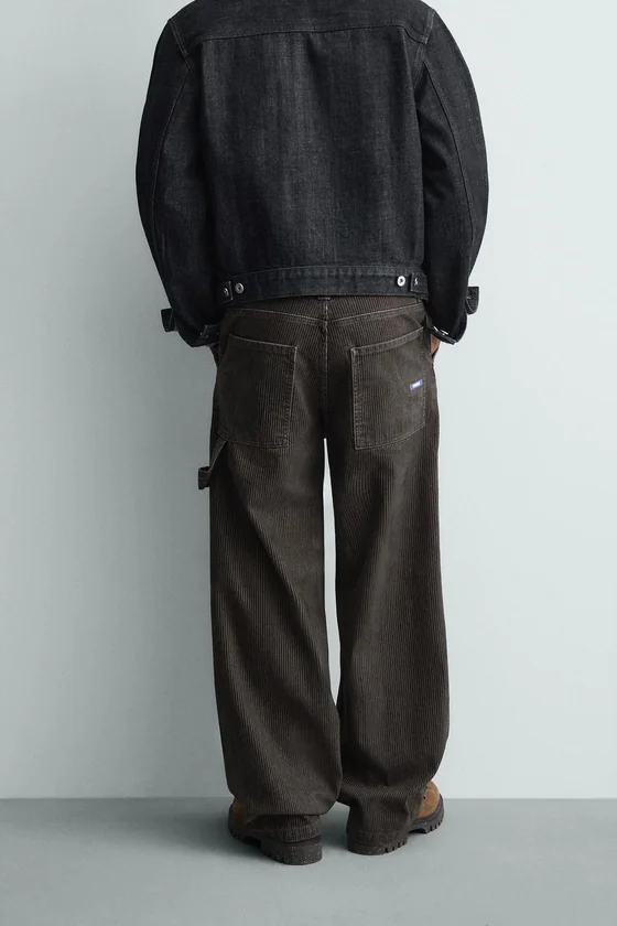 БРЮКИ RELAXED FIT С ФЛОКИРОВАННЫМИ ПОЛОСКАМИ