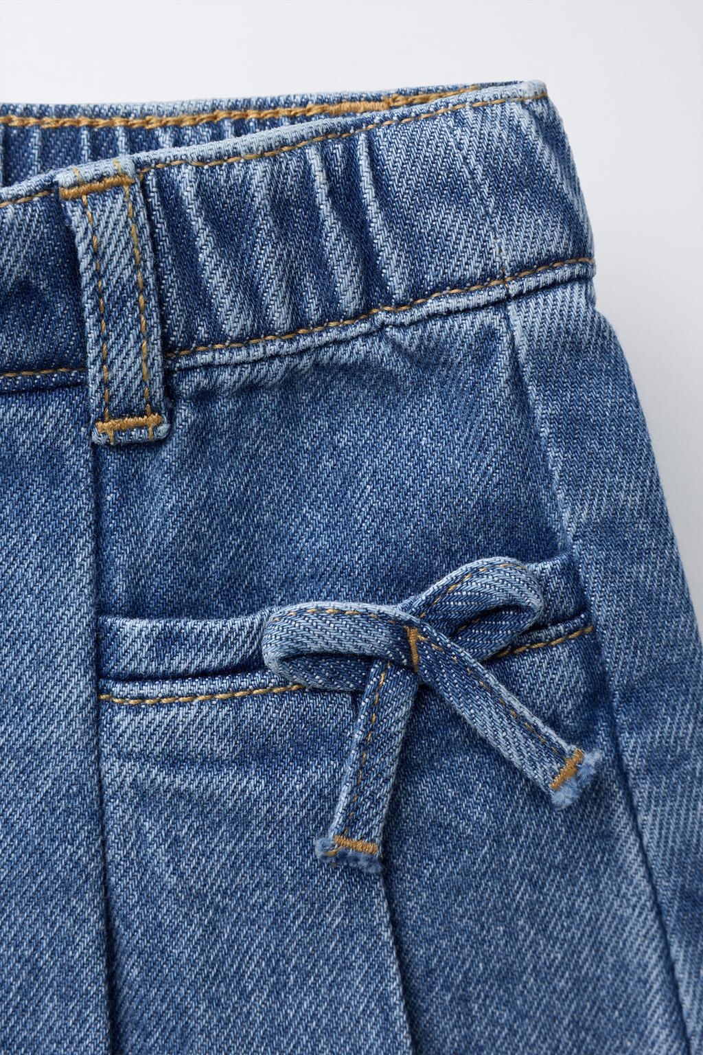 ДЖИНСОВАЯ ЮБКА В СКЛАДКУ С БАНТАМИ