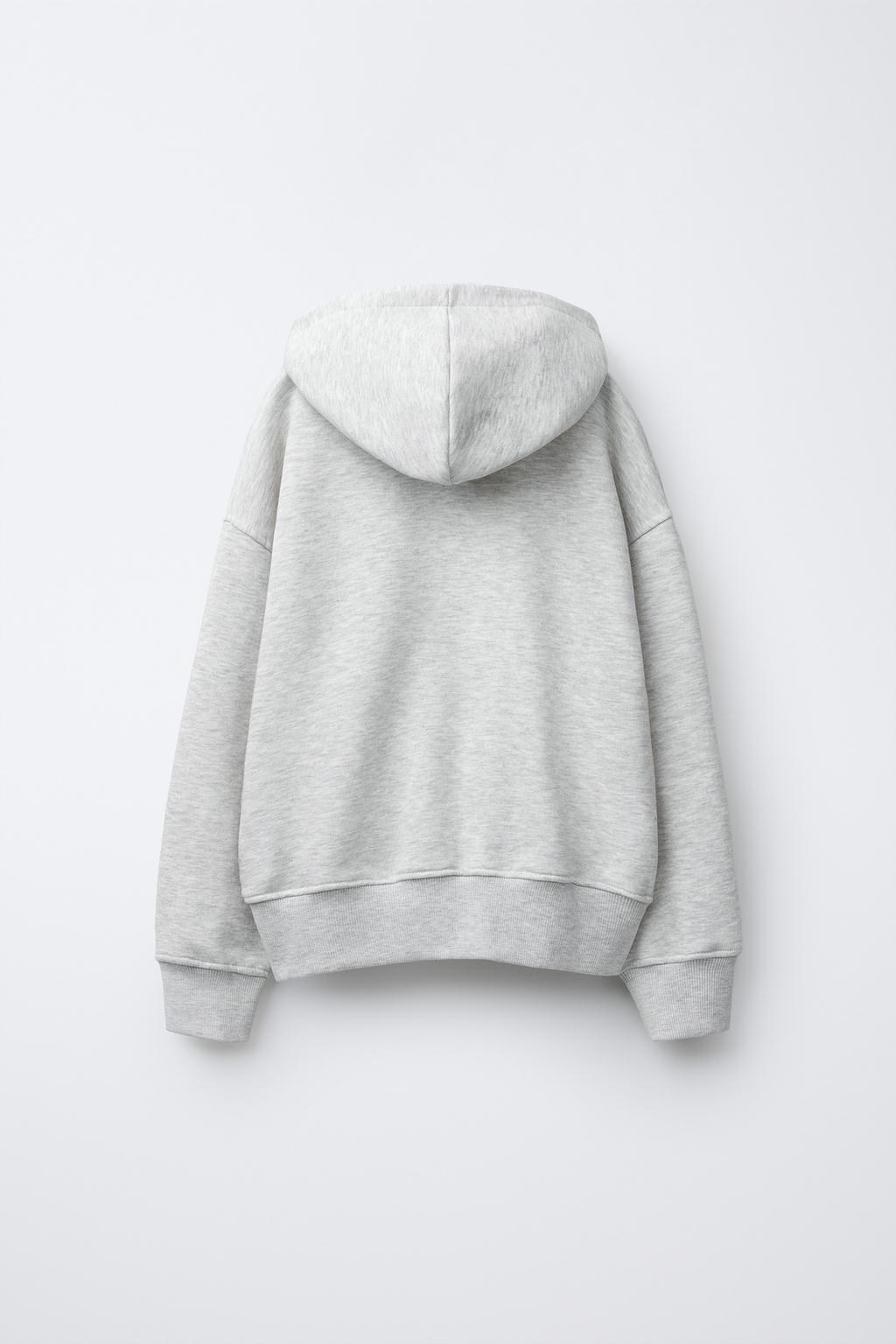 ТОЛСТОВКА НА МОЛНИИ С АНИМАЛИСТИЧЕСКИМ ПРИНТОМ ЗВЕЗДЫ