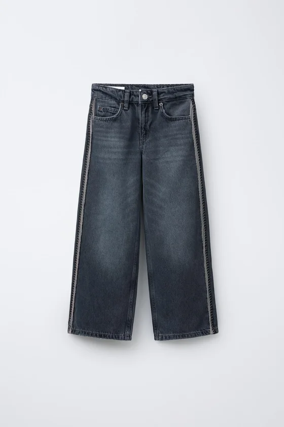 ДЖИНСЫ WIDE LEG С БЛЕСТЯЩЕЙ БАХРОМОЙ