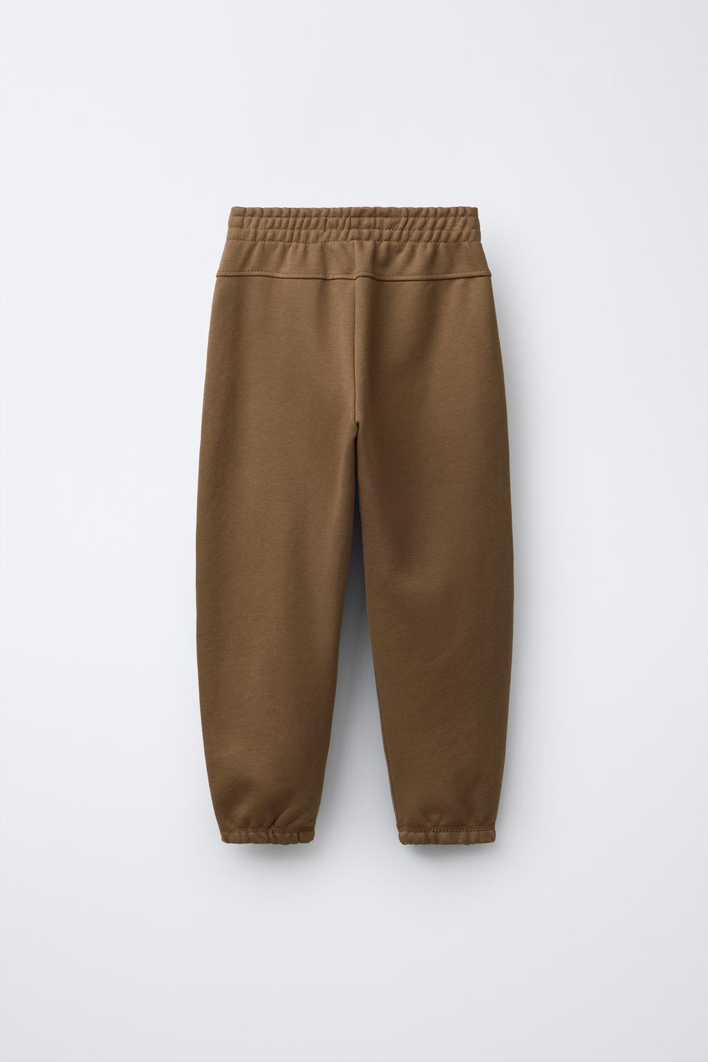 ДЖОГГЕРЫ ИЗ МЯГКОЙ ТКАНИ С НАДПИСЬЮ