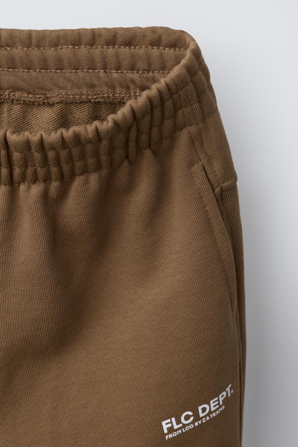 ДЖОГГЕРЫ ИЗ МЯГКОЙ ТКАНИ С НАДПИСЬЮ