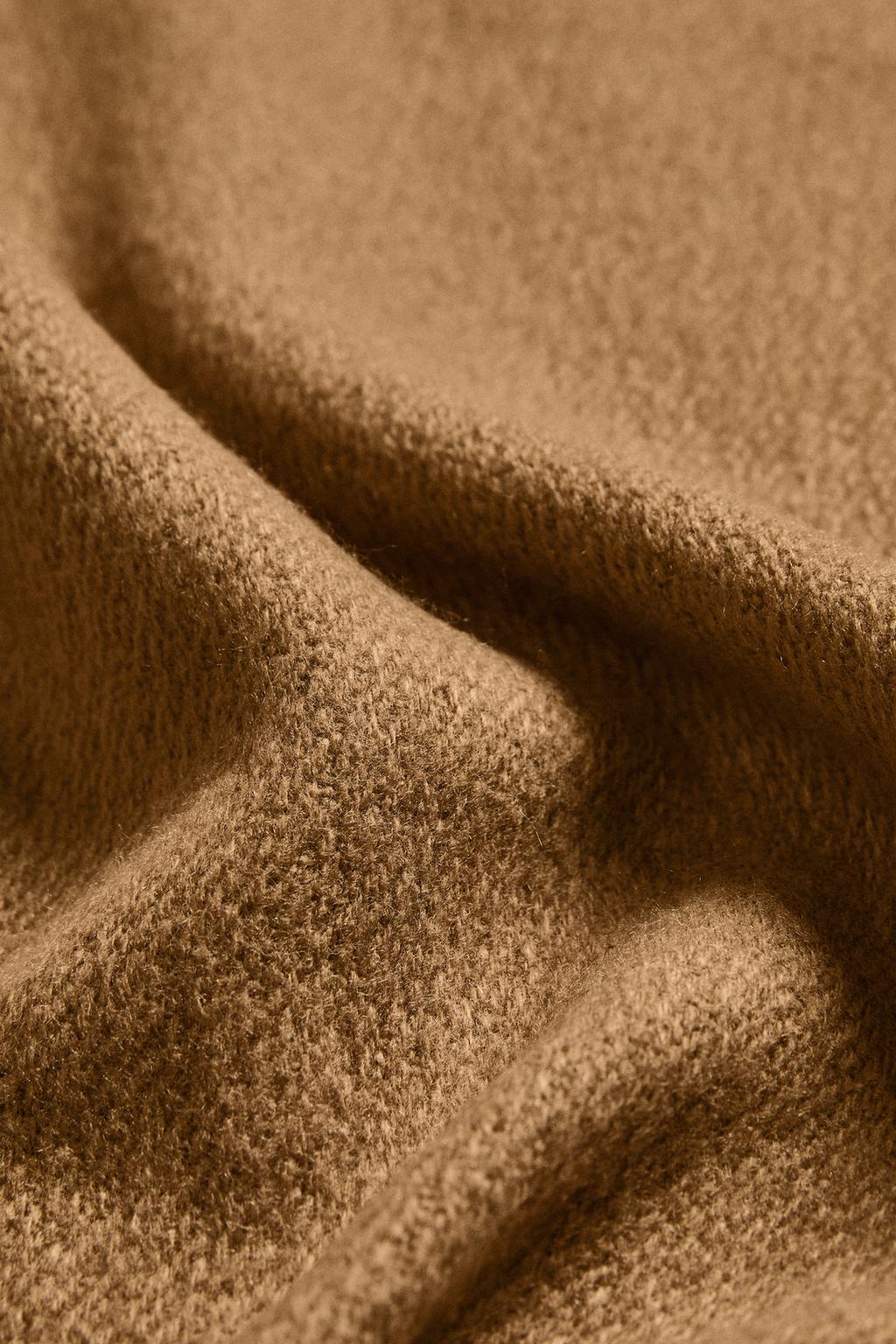 Декоративное покрывало с бахромой