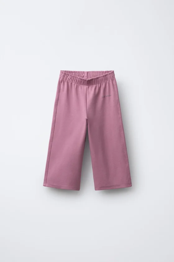БРЮКИ WIDE LEG ИЗ МЯГКОЙ ТКАНИ С РЕЛЬЕФНОЙ НАДПИСЬЮ