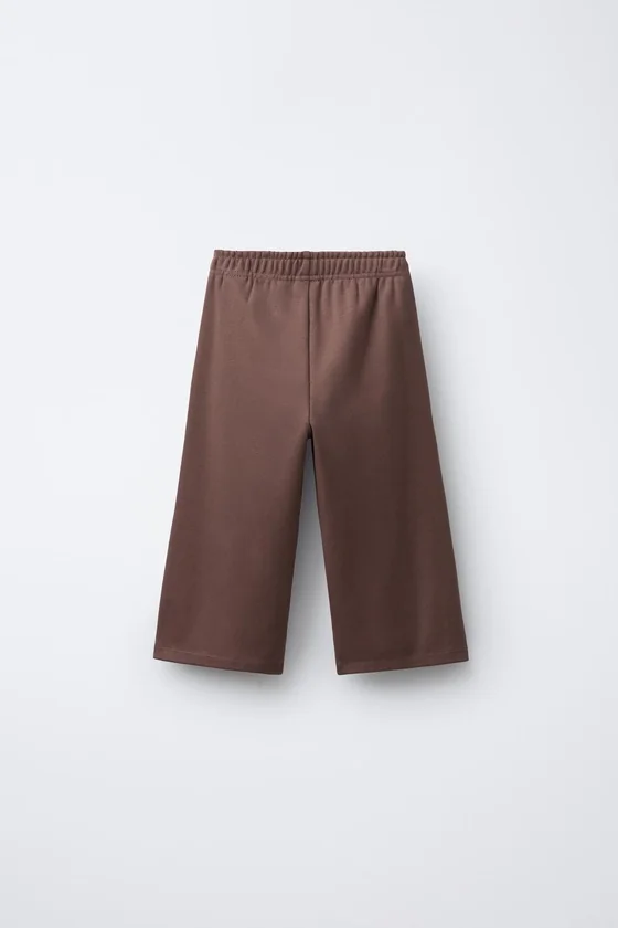 БРЮКИ WIDE LEG ИЗ МЯГКОЙ ТКАНИ С РЕЛЬЕФНОЙ НАДПИСЬЮ