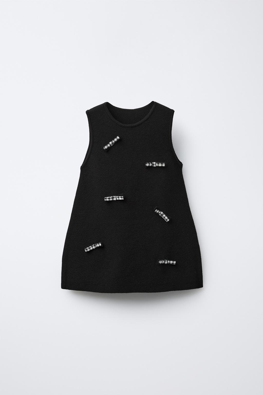 ТРИКОТАЖНОЕ ПЛАТЬЕ С БАНТАМИ В КЛЕТКУ ВИШИ