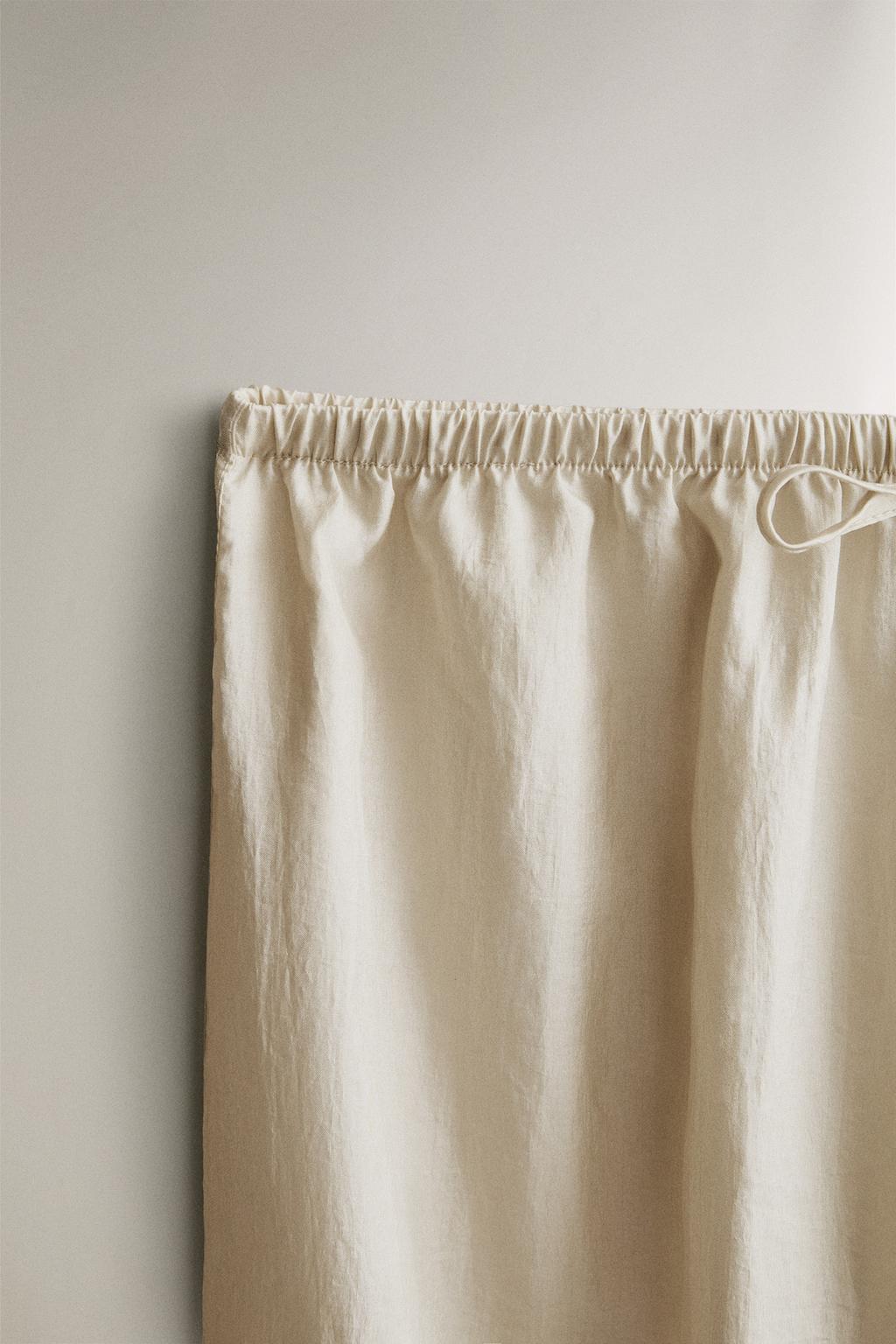 Брюки с атласным блеском