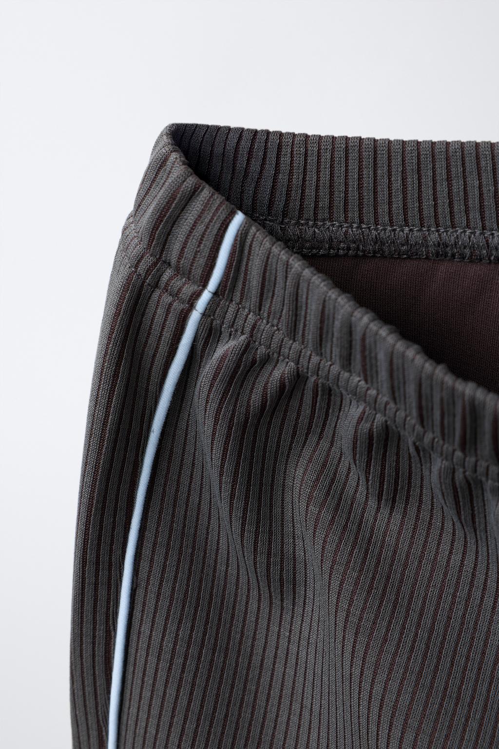 БРЮКИ FLARE В РУБЧИК С МОДАЛОМ