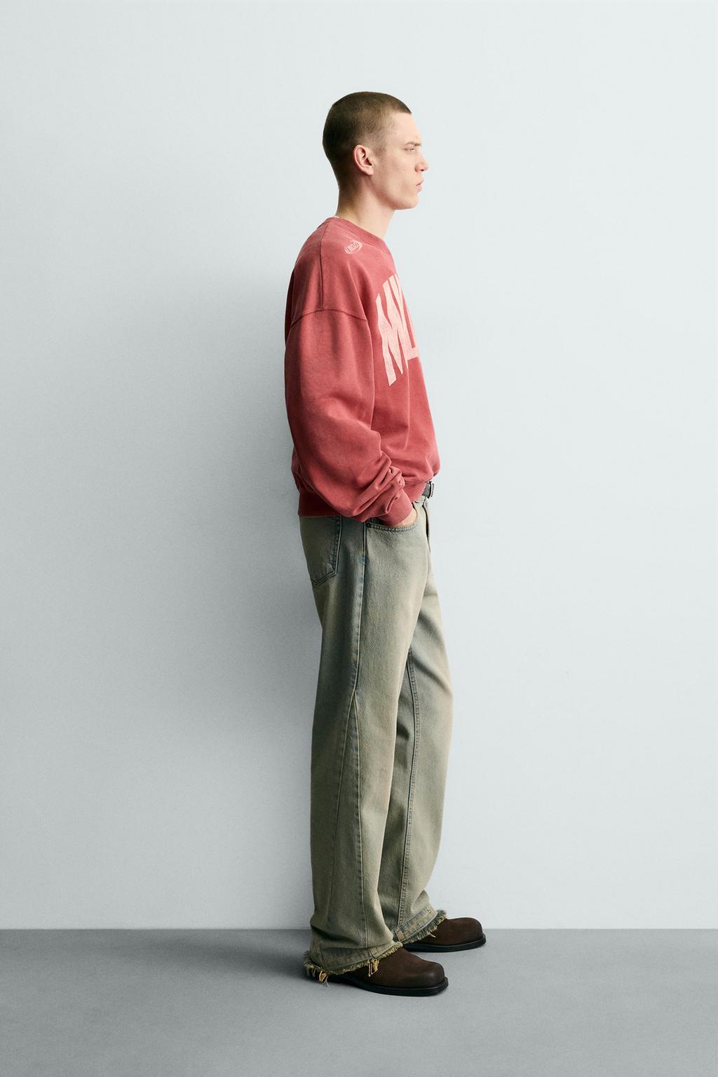 ТОЛСТОВКА С ЭФФЕКТОМ ПОТЕРТОСТИ И КОНТРАСТНЫМ ПРИНТОМ