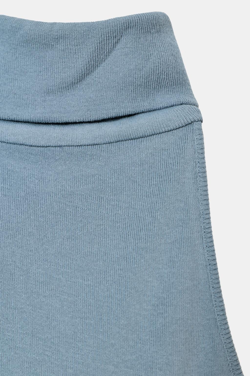 ТОП С ВЫСОКИМ ВОРОТНИКОМ БЕЗ РУКАВОВ