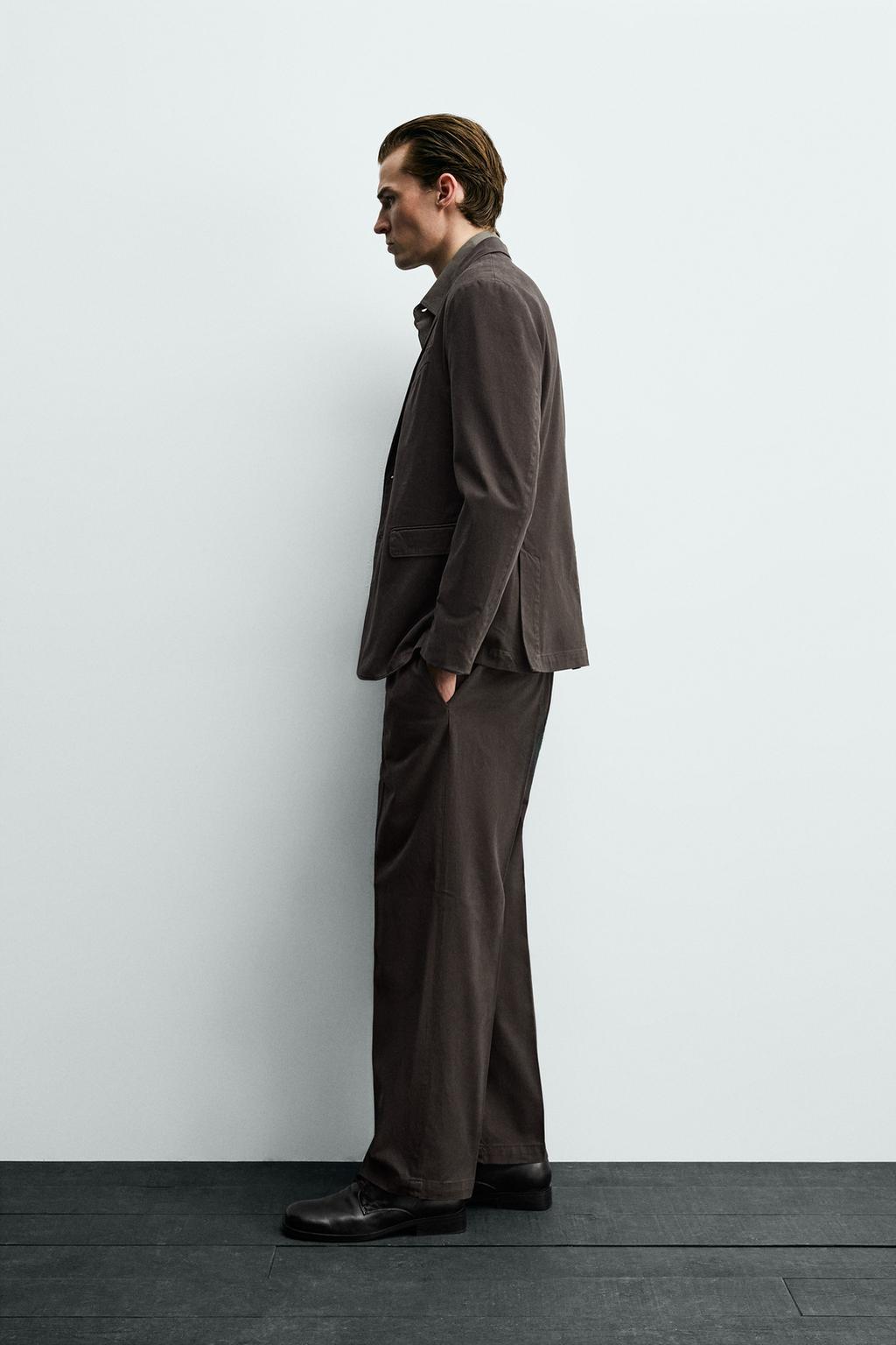 БРЮКИ С ЭФФЕКТОМ ПОТЕРТОСТИ