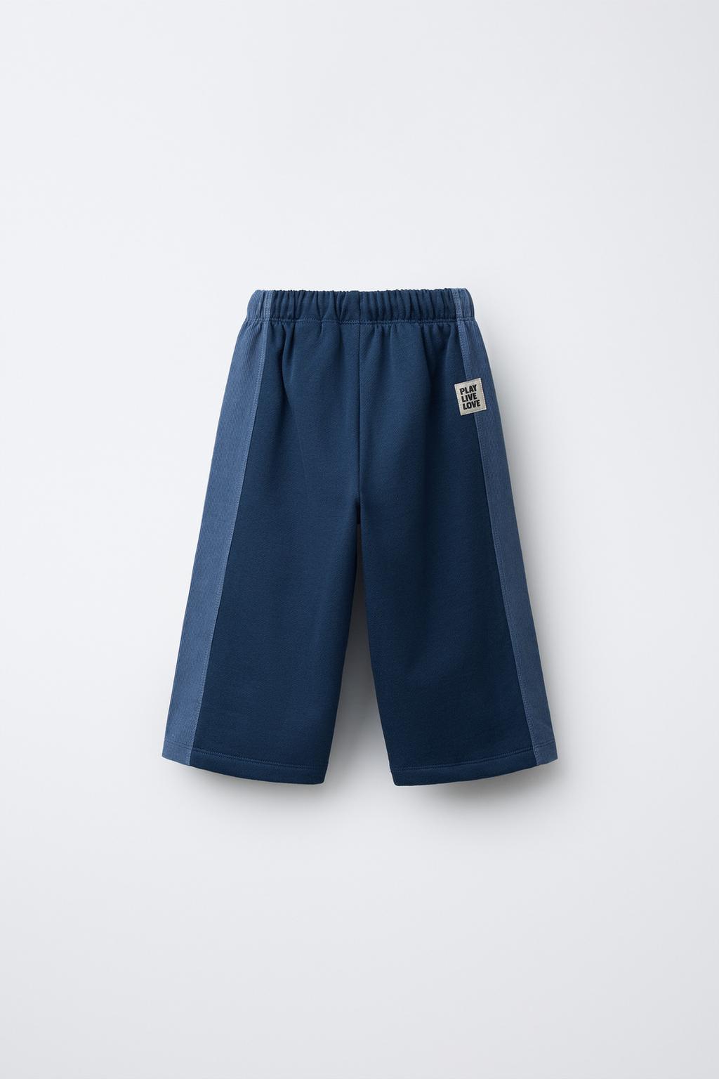 ПРЯМЫЕ БРЮКИ ИЗ МЯГКОЙ ТКАНИ С БОКОВЫМИ ПОЛОСАМИ ИЗ ВЕЛЬВЕТА