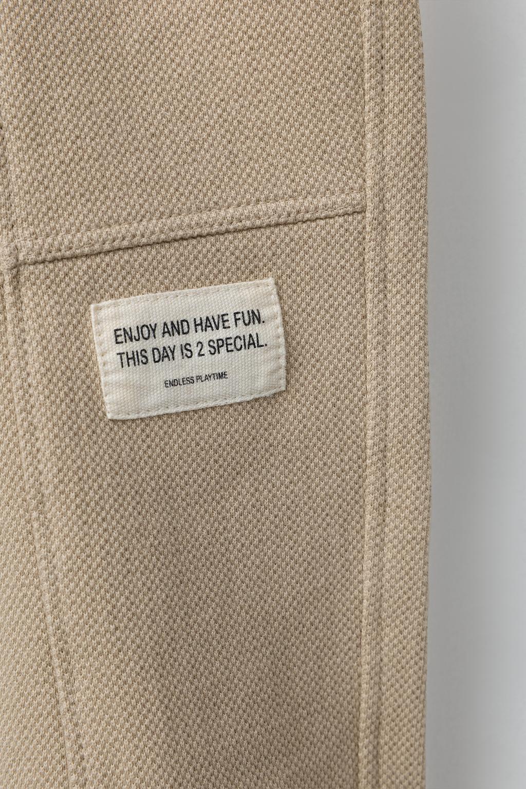 БРЮКИ-ДЖОГГЕРЫ С ЭТИКЕТКОЙ