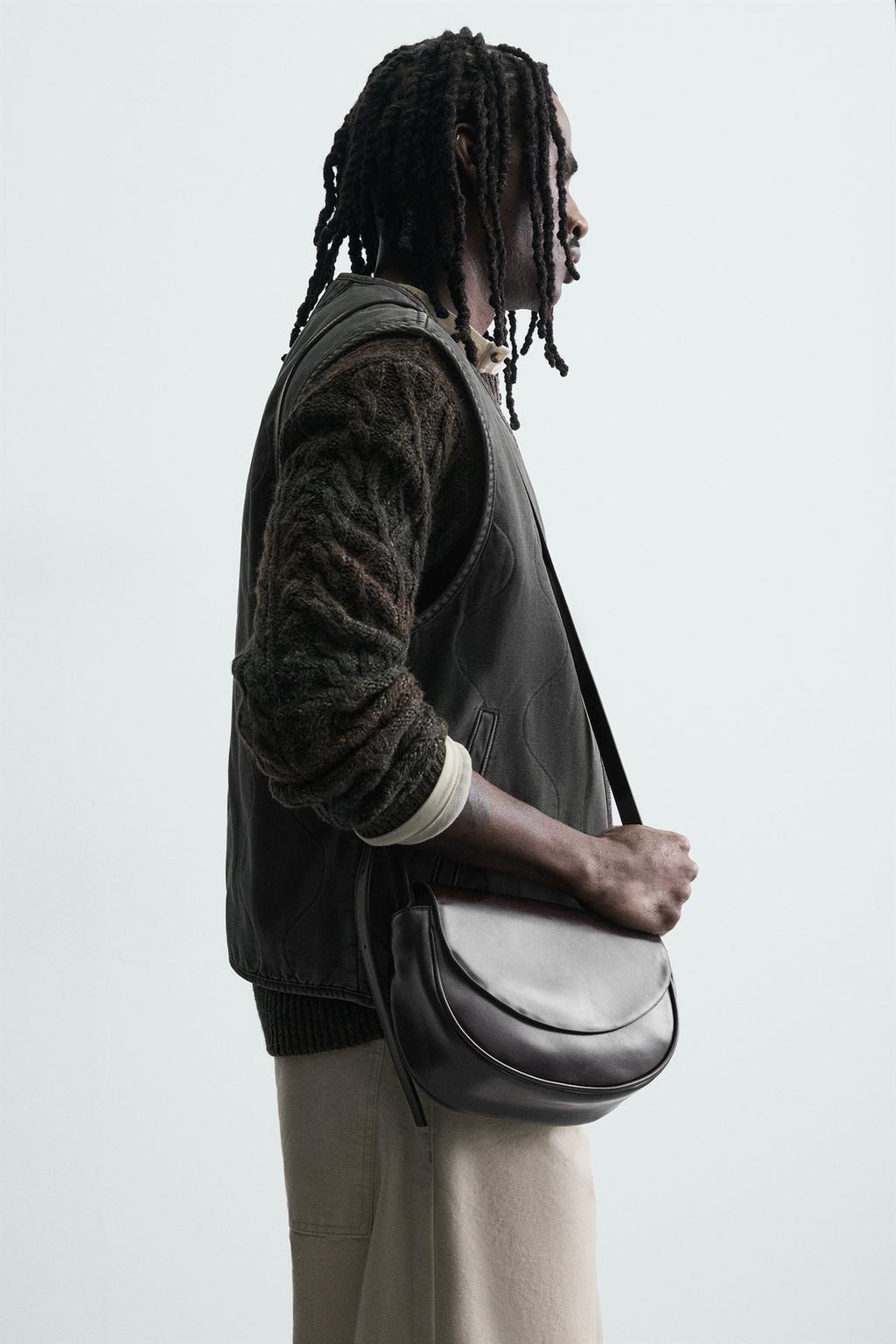 ЖИЛЕТ С ЭФФЕКТОМ ПОТЕРТОСТИ И ОТСТРОЧКОЙ