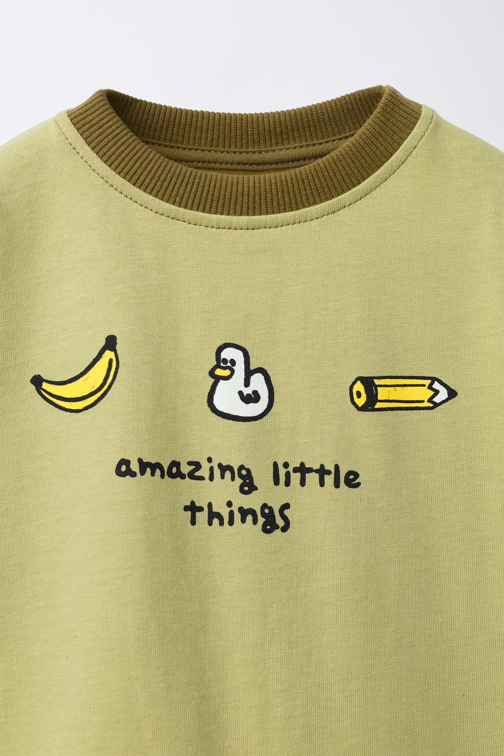 ФУТБОЛКА С КОНТРАСТНЫМИ РУКАВАМИ И ПРИНТОМ