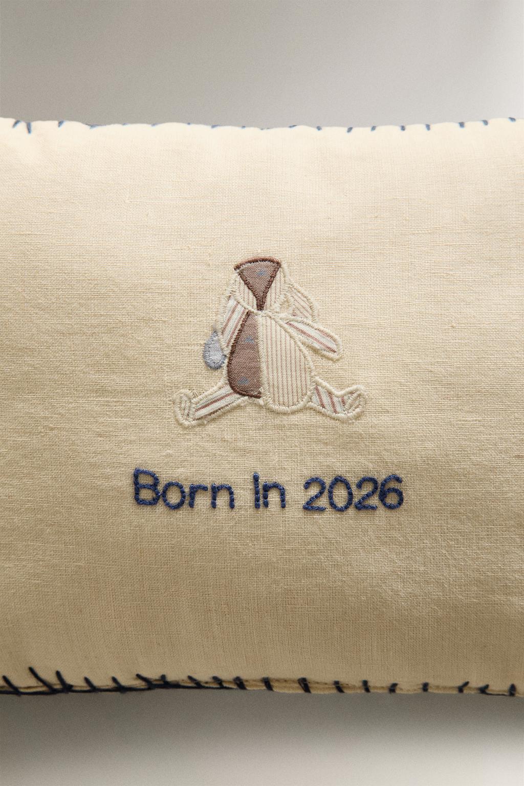 Детская подушка из льна с вышитыми кроликами