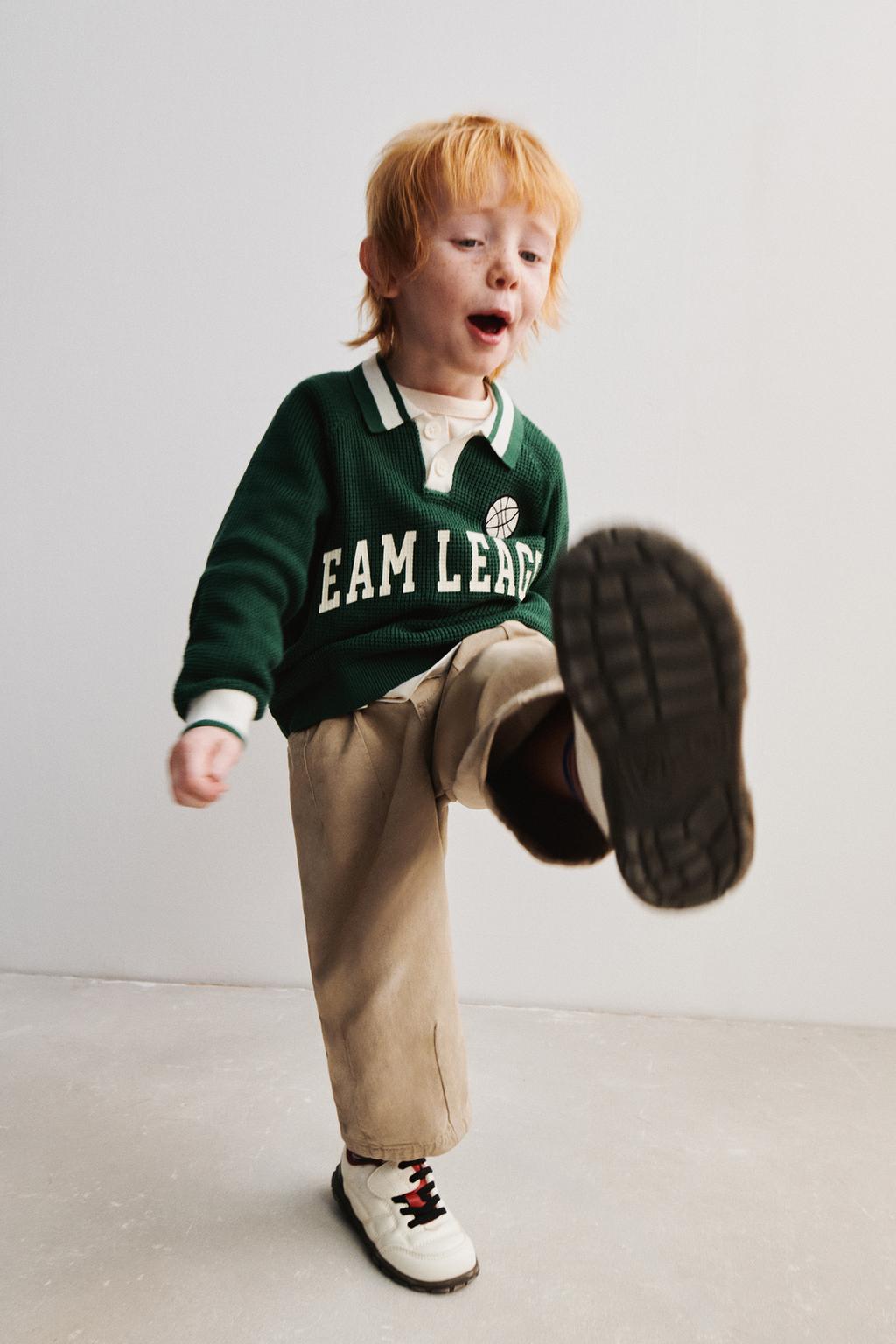 ПОЛО ВАФЕЛЬНОЙ ВЯЗКИ С ТЕКСТОМ