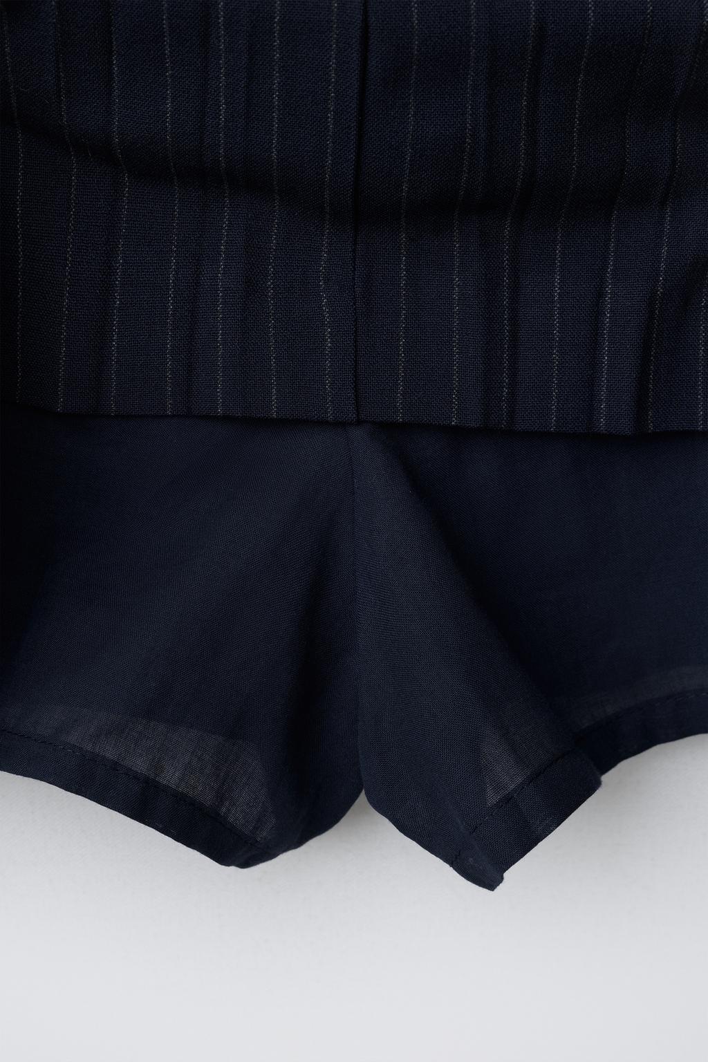 ЮБКА В ТОНКУЮ ПОЛОСКУ С ПОЯСОМ