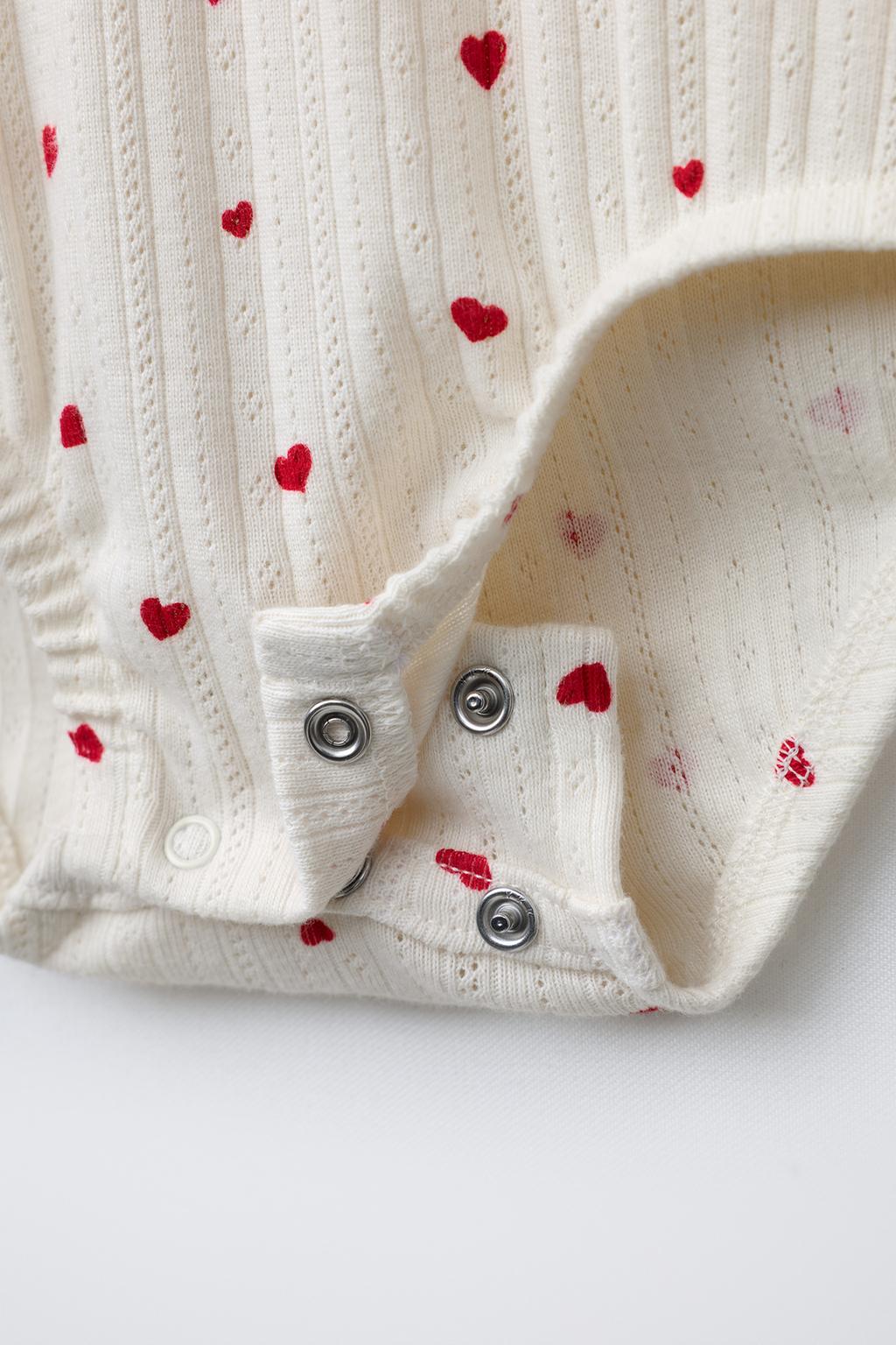 КОМПЛЕКТ ИЗ БОДИ И ЛЕГИНСОВ С СЕРДЕЧКАМИ