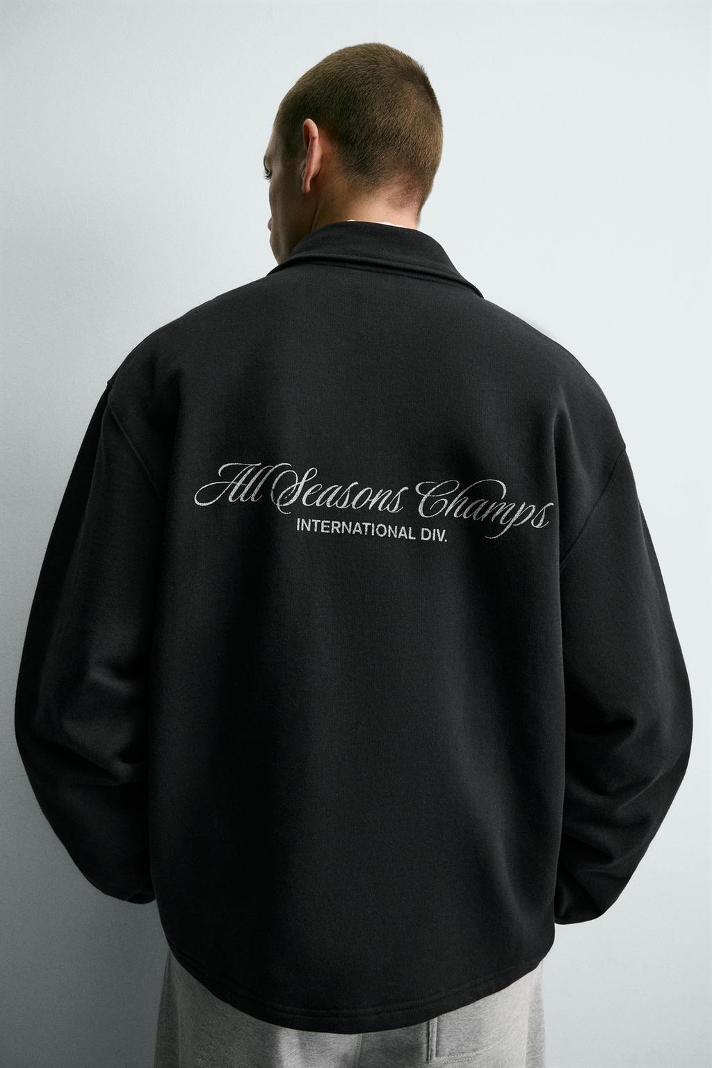 ТОЛСТОВКА С ЗАСТЕЖКОЙ-МОЛНИЕЙ И НАДПИСЯМИ