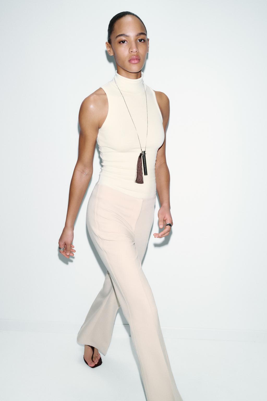 РАСКЛЕШЕННЫЕ БРЮКИ С БОКОВЫМИ ШВАМИ