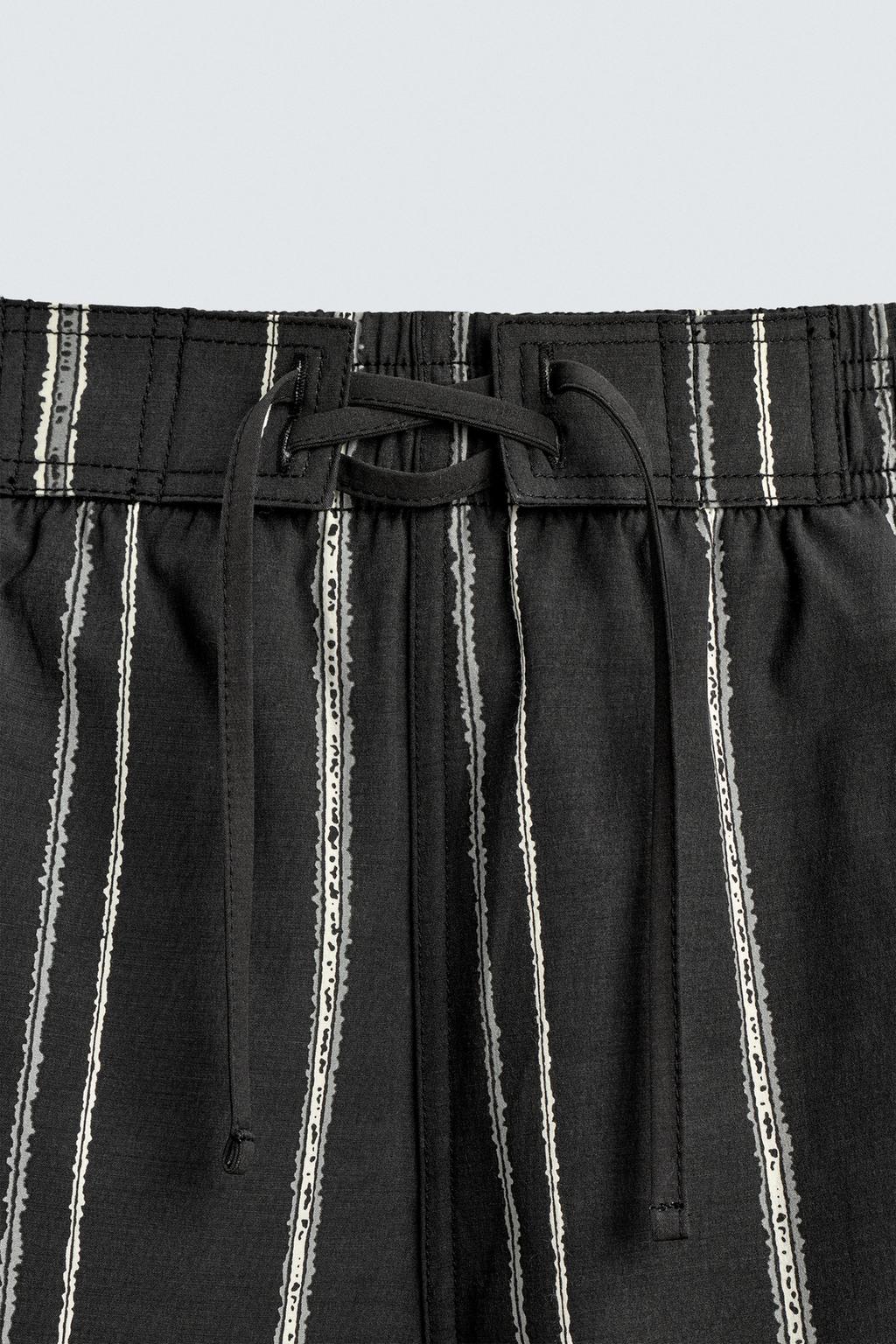 Полосатые плавательные трусы