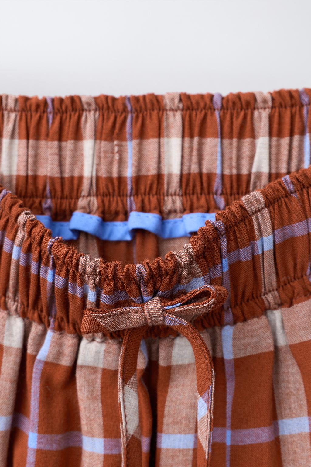 ЮБКА МИДИ В КЛЕТКУ ИЗ ПАНЕЛЕЙ