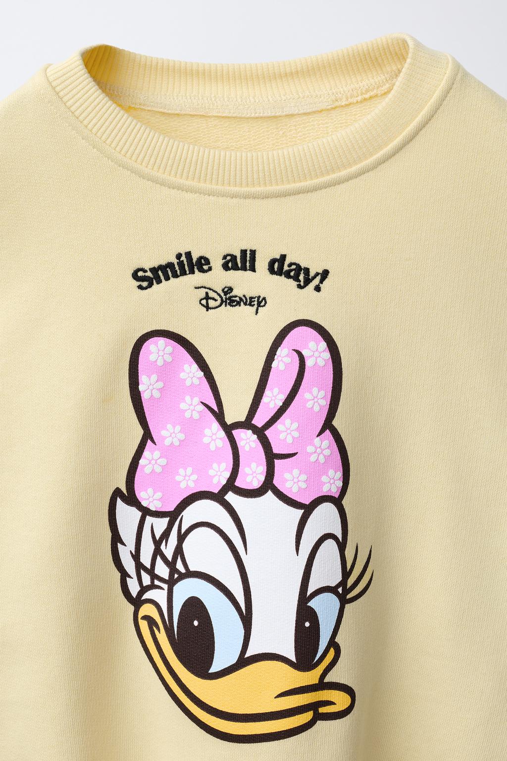 ТОЛСТОВКА С ПРИНТОМ «МАРГАРИТКИ DAISY» © DISNEY