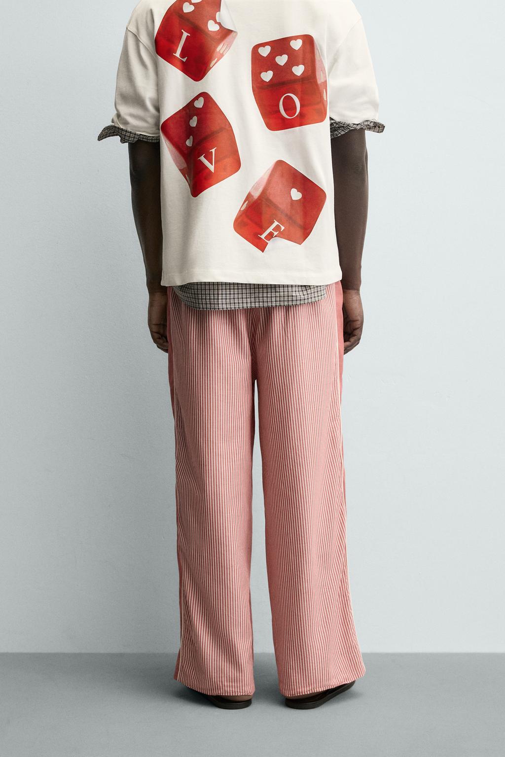 БРЮКИ В ПОЛОСКУ С КОНТРАСТНЫМИ ЛАМПАСАМИ