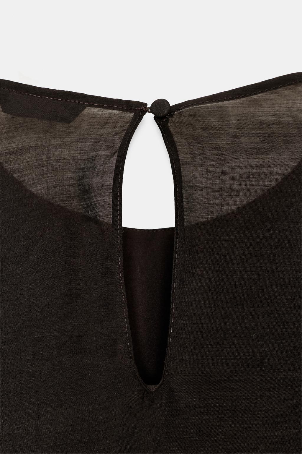 АСИММЕТРИЧНЫЙ ТОП С ВОЛАНАМИ