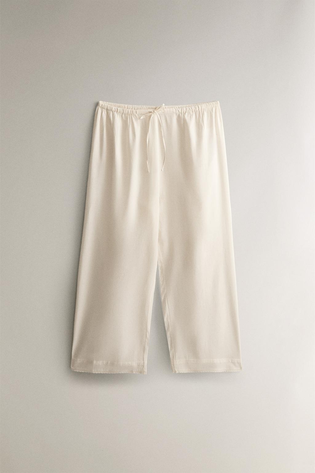 Брюки с кружевными вставками