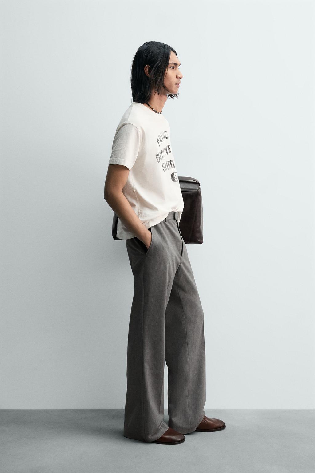 ФУТБОЛКА СВОБОДНОГО КРОЯ С ЭФФЕКТОМ ПОТЕРТОСТИ