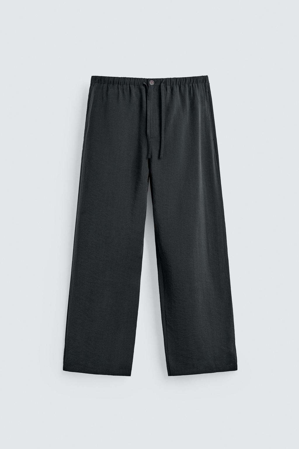 Потрепанные брюки свободного кроя