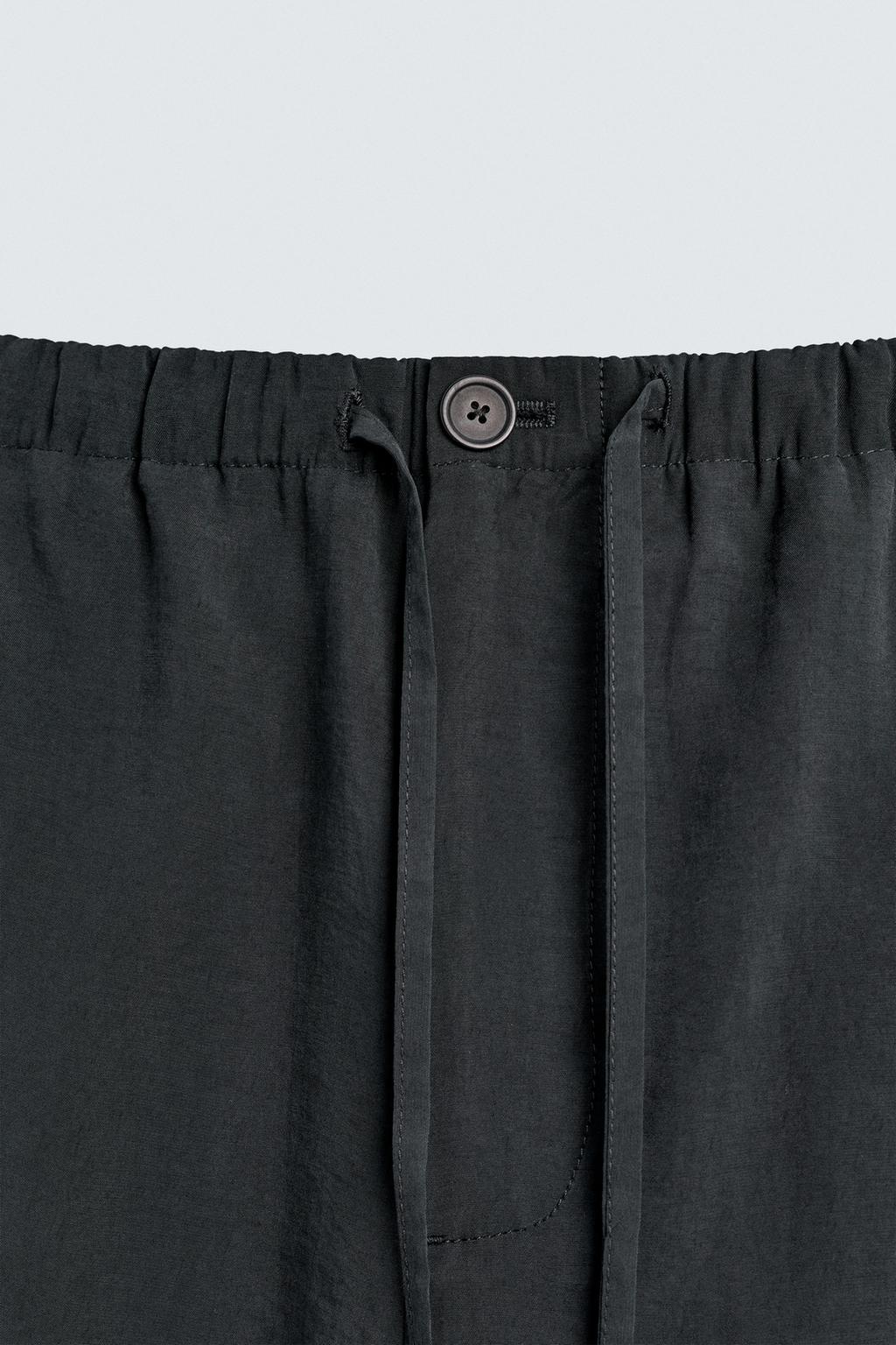 Потрепанные брюки свободного кроя