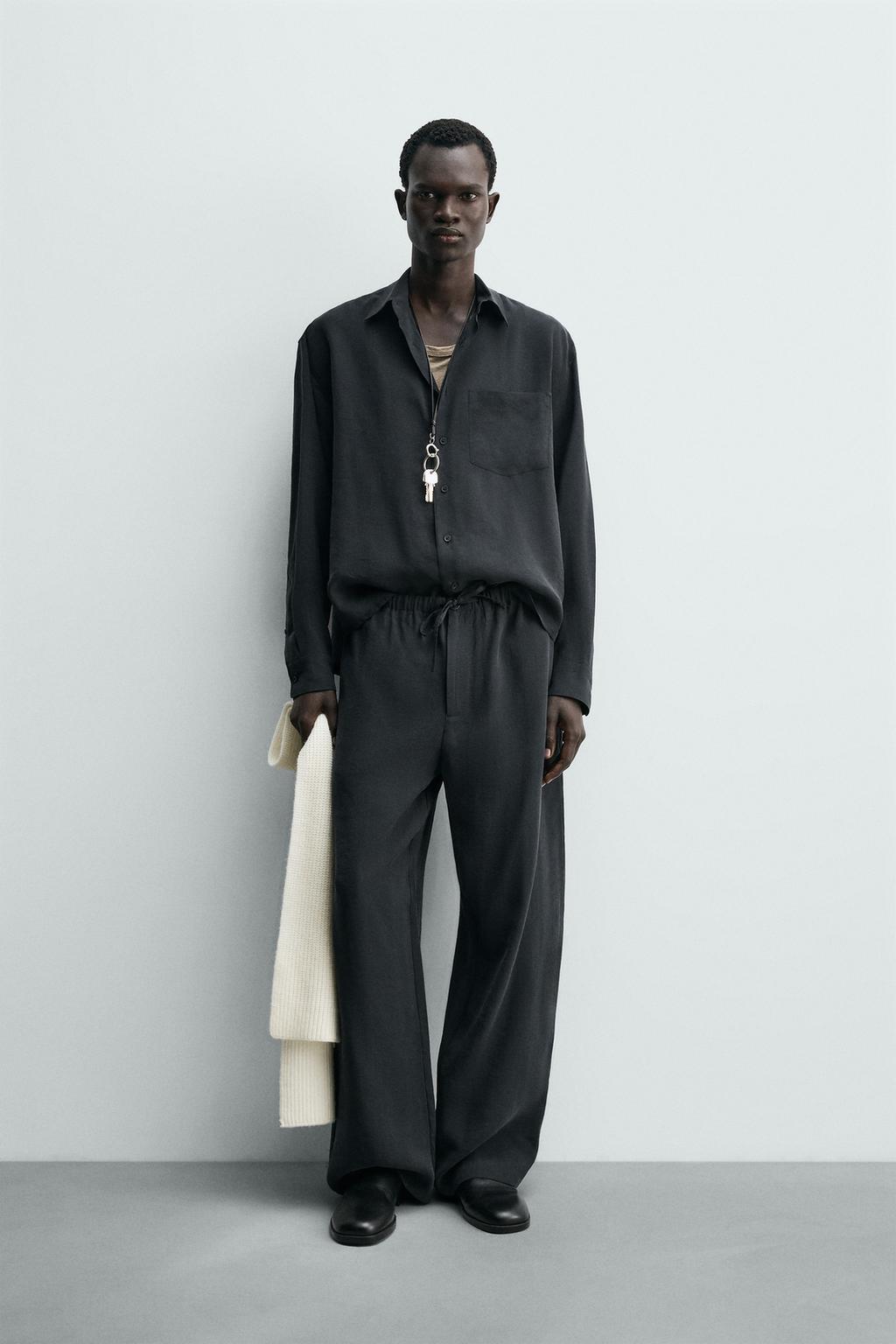 Потрепанные брюки свободного кроя