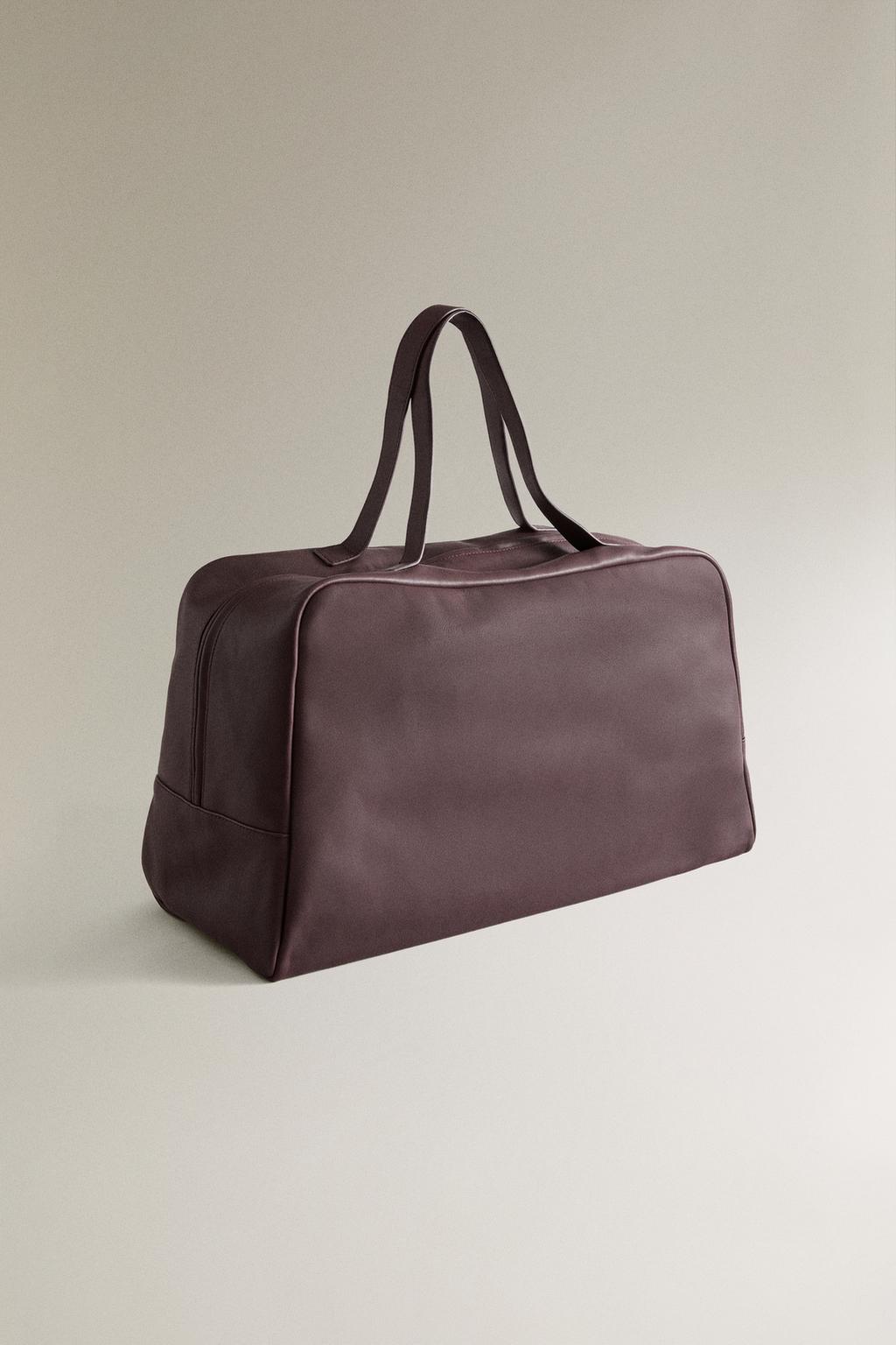 Кожаная сумка для путешествий