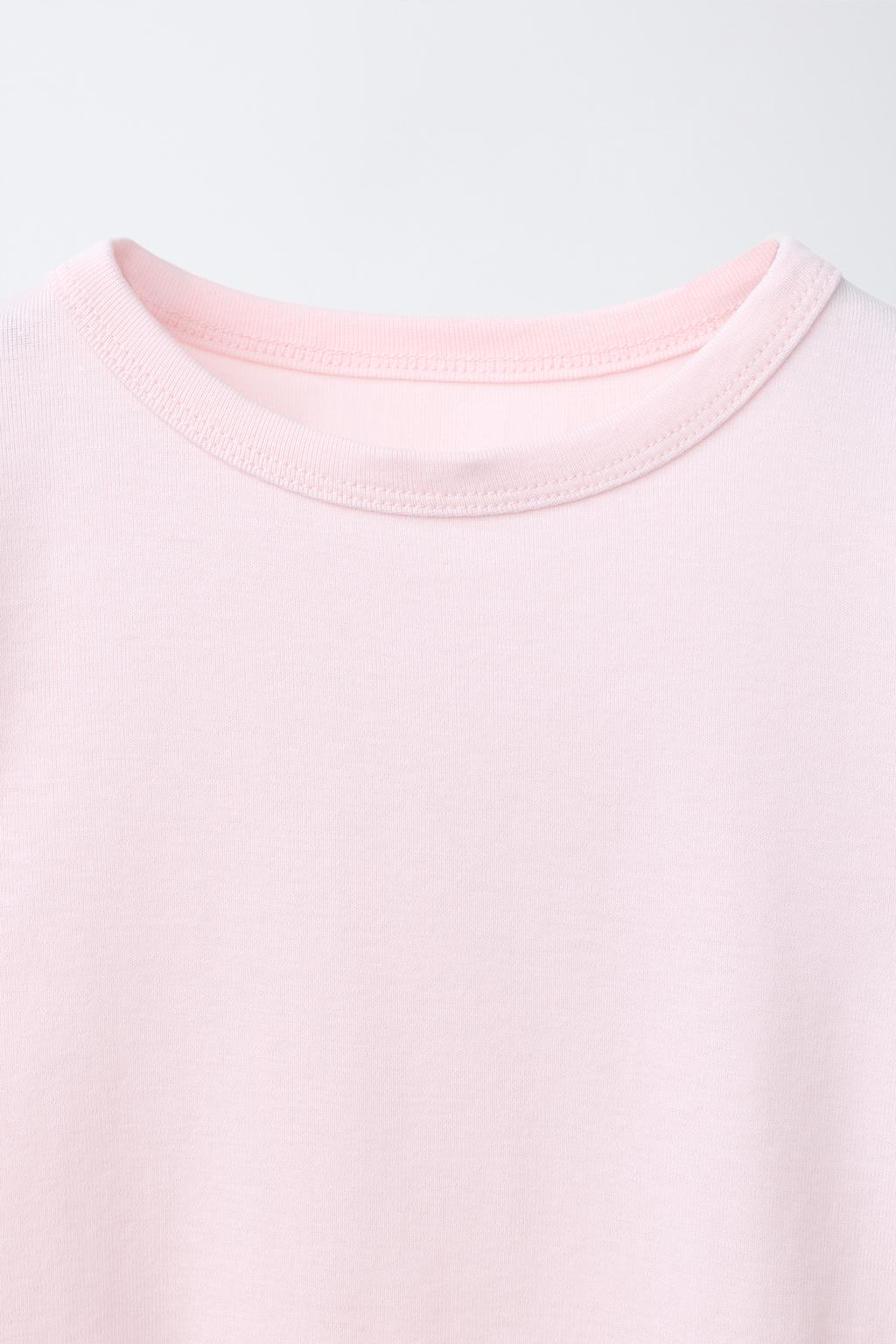 ФУТБОЛКА ИЗ МОДАЛА С ВЫРЕЗАМИ И БАНТАМИ