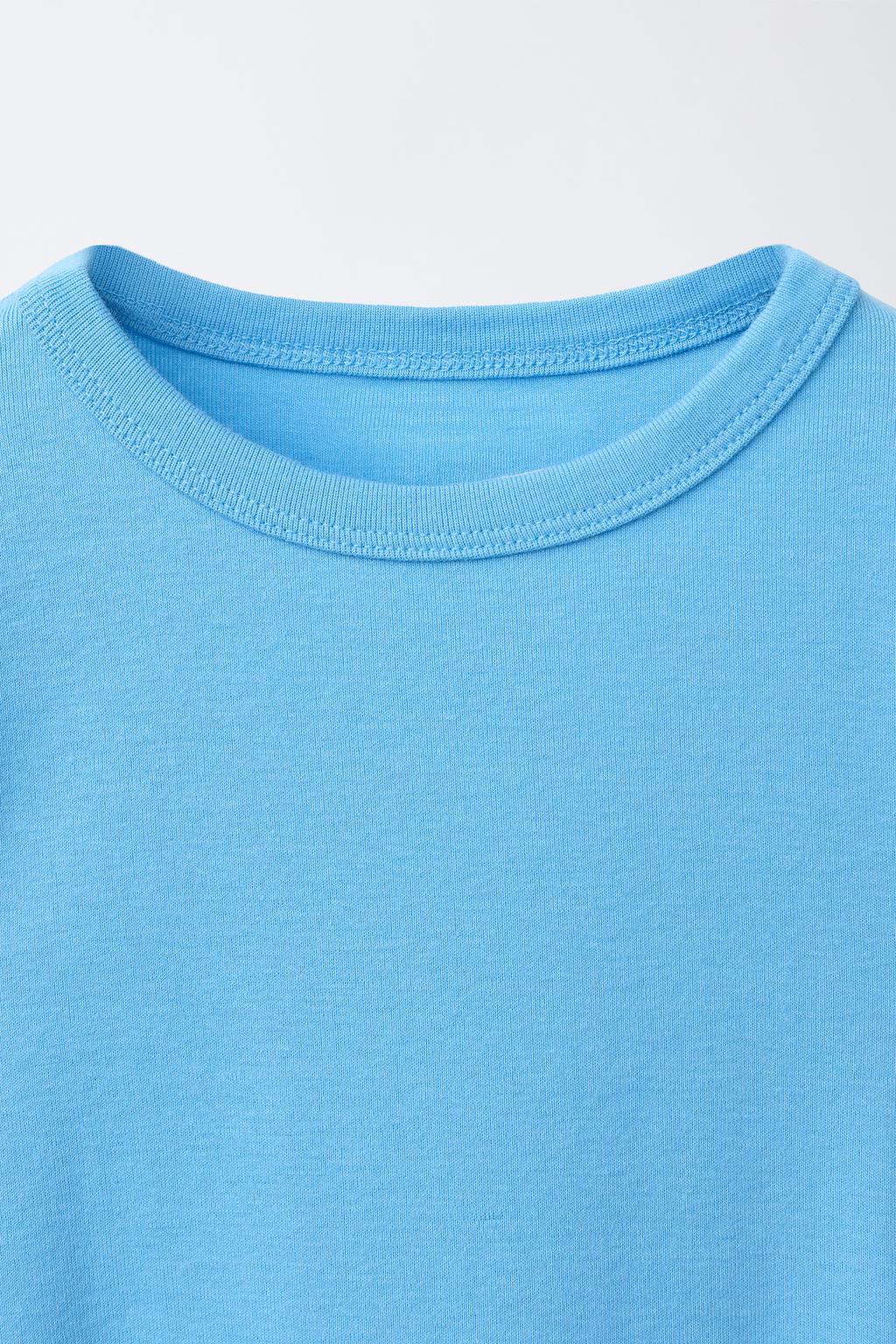 ФУТБОЛКА ИЗ МОДАЛА С ВЫРЕЗАМИ И БАНТАМИ