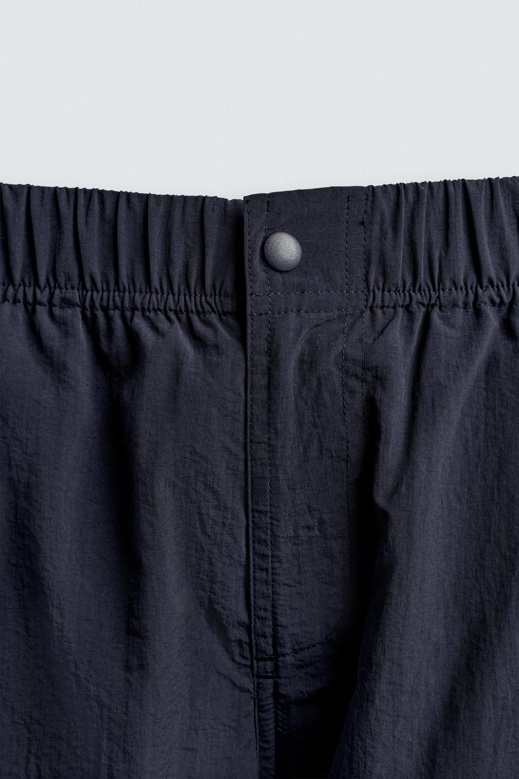 БРЮКИ RELAXED FIT ИЗ ВЫСОКОТЕХНОЛОГИЧНОЙ ТКАНИ LIMITED EDITION