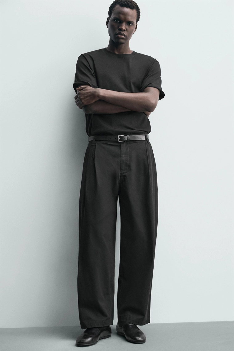 Широкие брюки с защипами