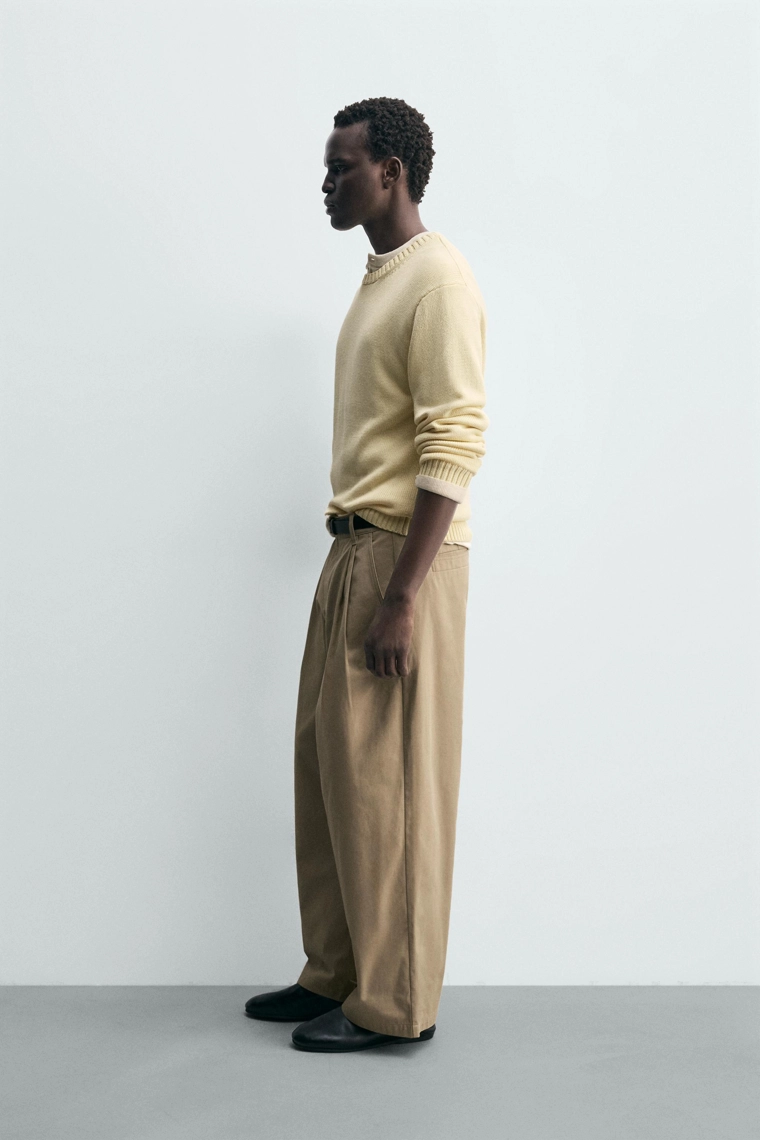 Широкие брюки с защипами