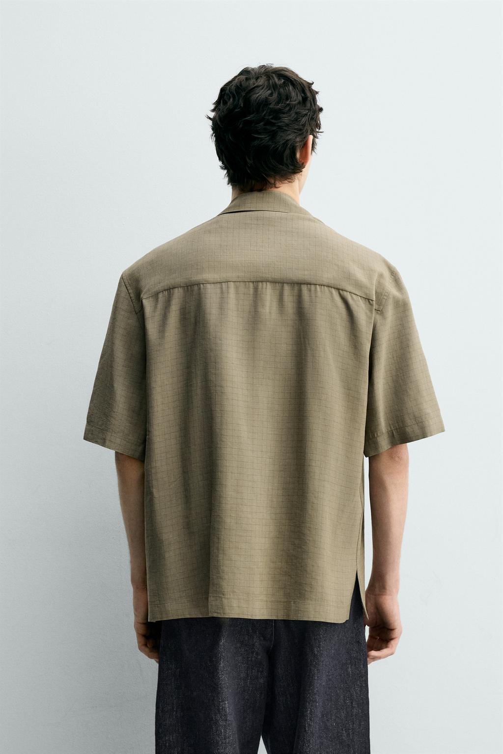 Рубашка в клетку с плавными линиями