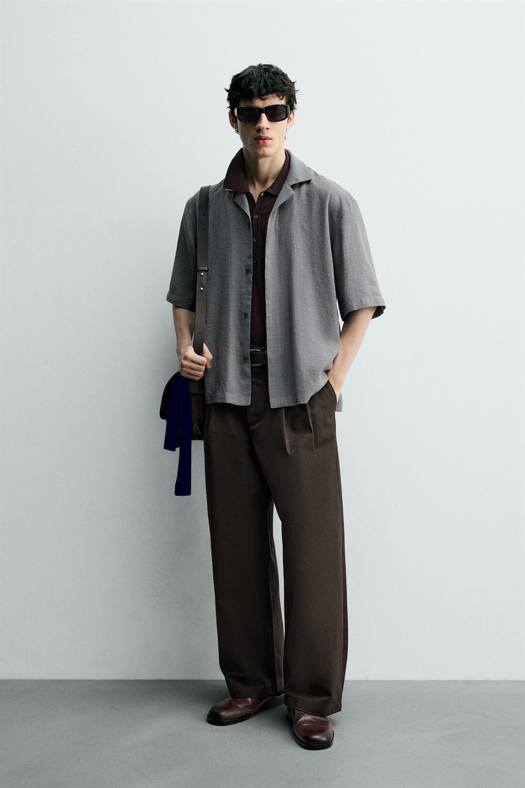 Рубашка в клетку с плавным фасоном