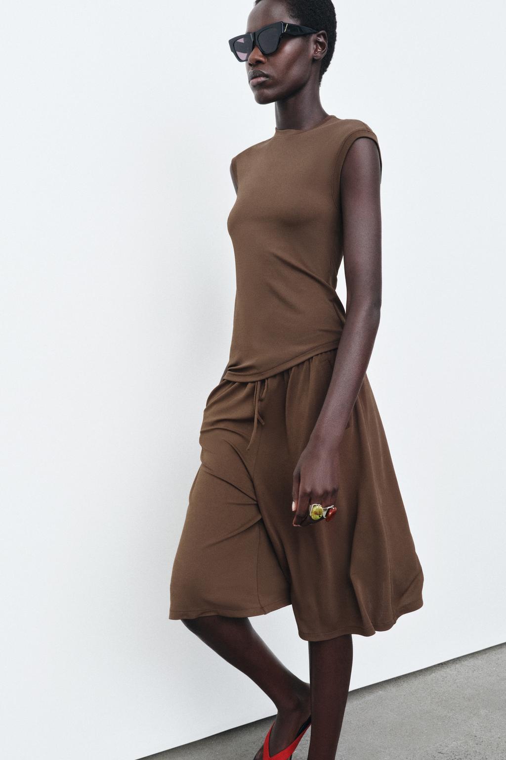 АСИММЕТРИЧНАЯ ФУТБОЛКА БЕЗ РУКАВОВ