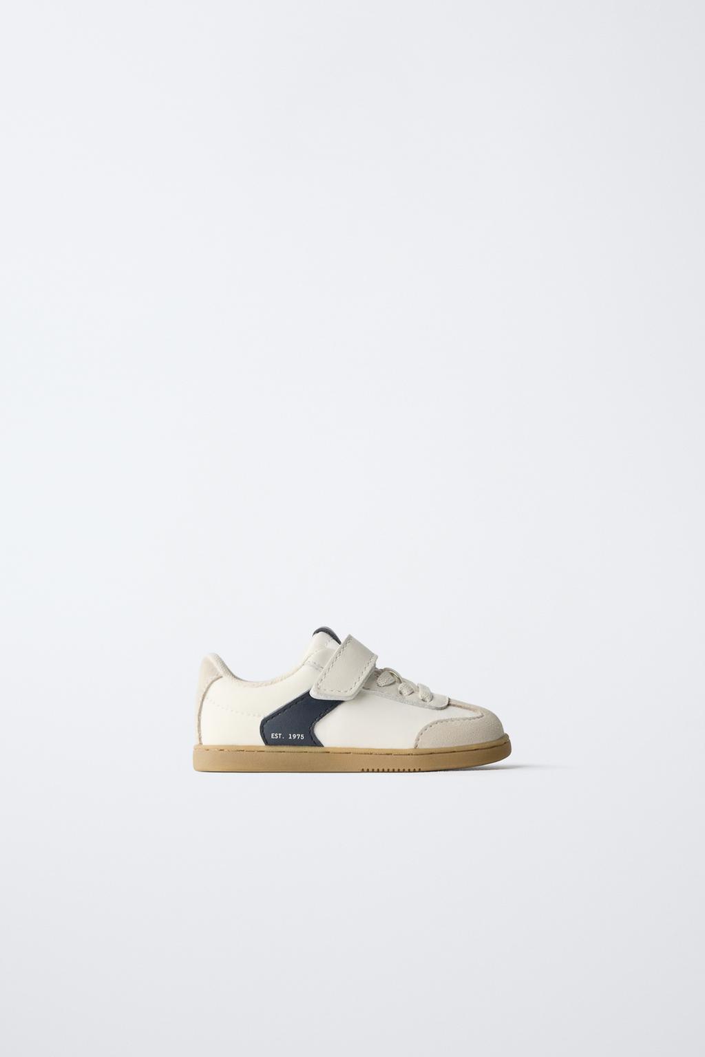 Кроссовки с контрастными деталями