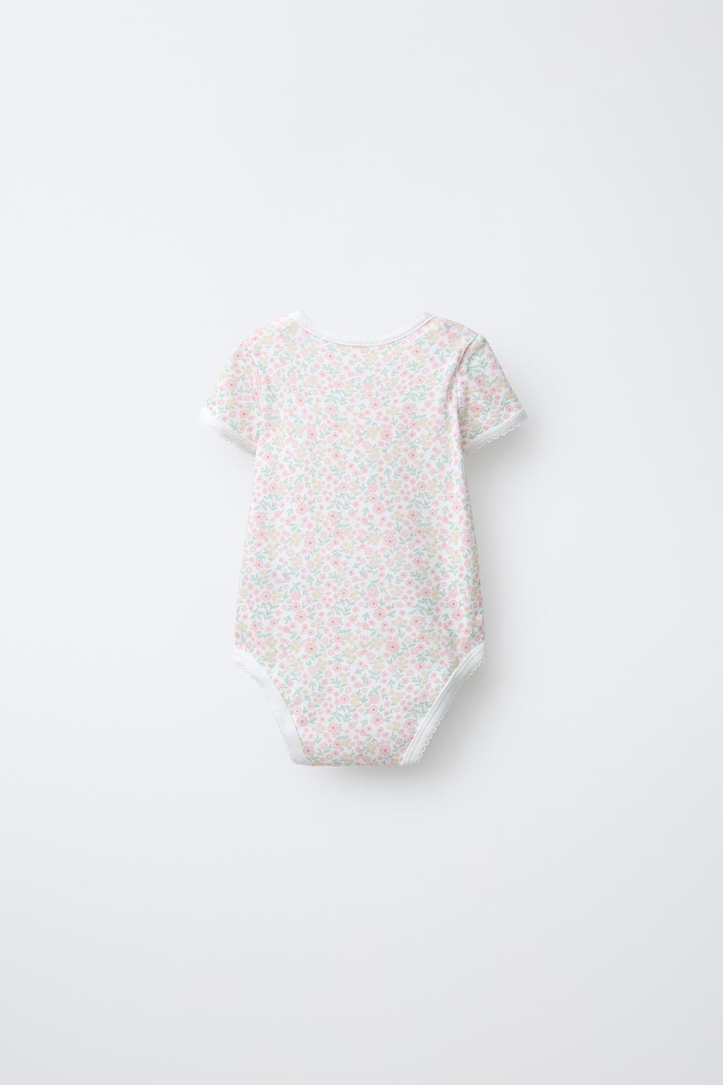 НАБОР ИЗ ПЯТИ БОДИ С КОРОТКИМИ РУКАВАМИ И ЦВЕТОЧНЫМ ПРИНТОМ